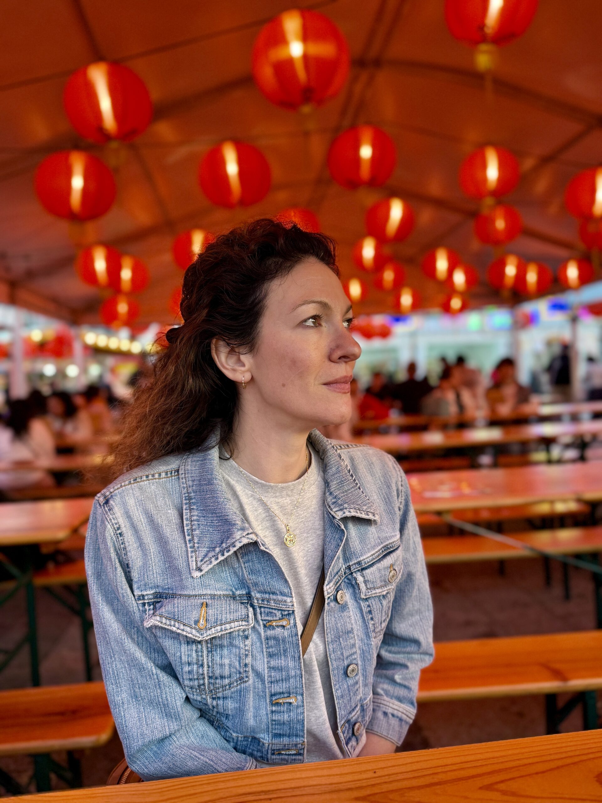 DrSydInJapan_RedLanterns Dr. Syd ND, sitting under red lanterns in Japan on a self-care and wellness journey.